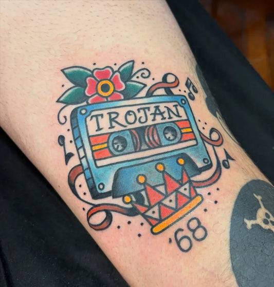 Medium American Traditional Cassette and Crown Music Tattoo on Men Arm by @suziq70