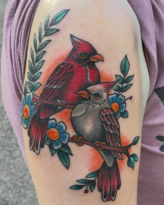 Medium American Traditional Couple of Cardinals with Flowers Tattoo on Women Upper Arm by @a_ron_crubbard