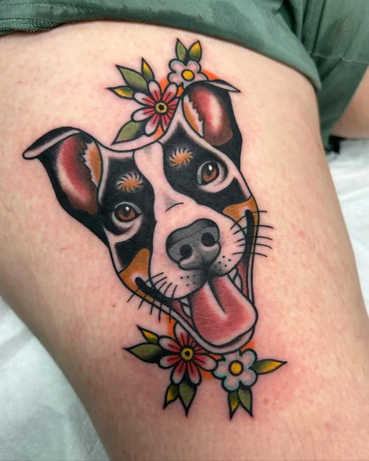 Medium American Traditional Dog with Flowers Tattoo on Women Thigh by @dmagalditattoos