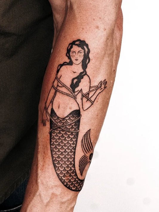 Medium American Traditional Mermaid Tattoo on Men Arm by @zoesonic.tattoos