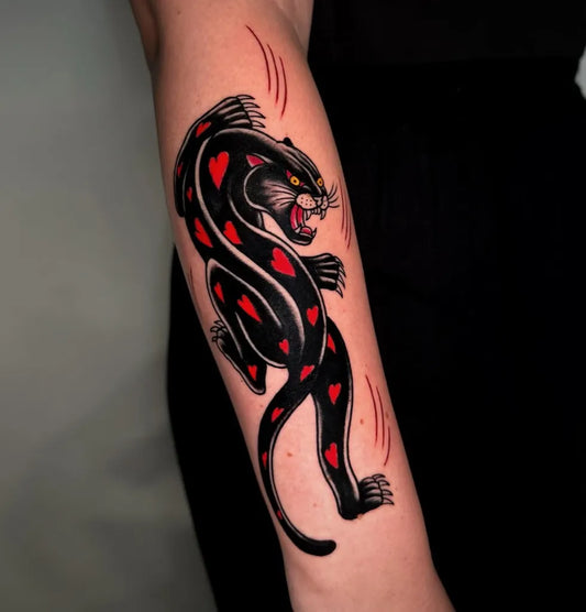Medium American Traditional Panther Tattoo on Women Arm by @dinoslois_tattoo