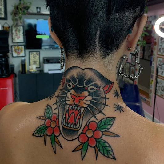 Medium American Traditional Panther and Flowers Tattoo on Women Neck by @eduardotrigueiro