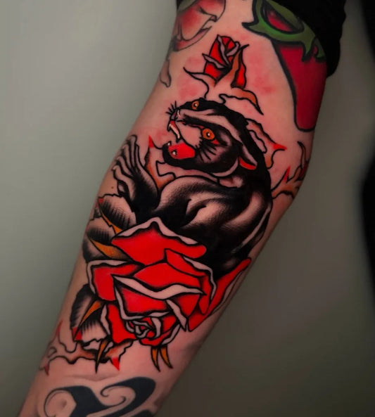 Medium American Traditional Panther and Rose Tattoo on Men Arm by @antonionatale_tats