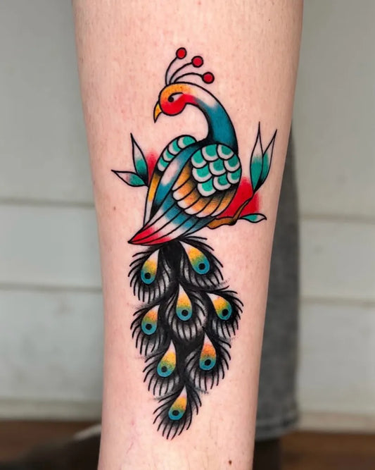 Medium American Traditional Peacock Tattoo on Women Leg by @shazztattoos