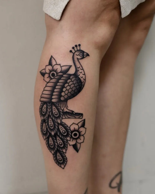 Medium American Traditional Peacock and Flowers Tattoo on Women Thigh by @tommytraditional