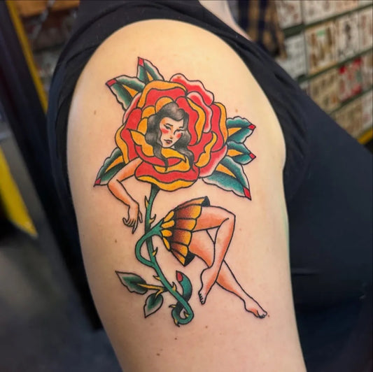 Medium American Traditional Pin Up Girl Rose Tattoo on Women Shoulder by @kikipainmaker