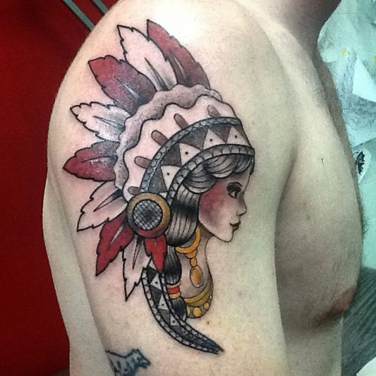 Medium American Traditional Pin Up Girl in Native Headdress Tattoo on Men Shoulder by @asianredtattoo