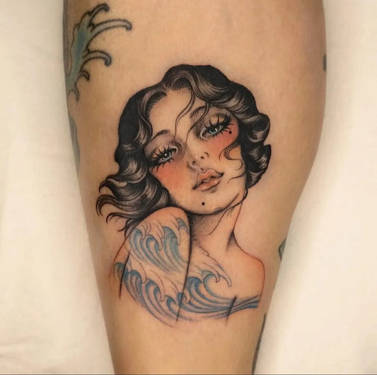 Medium American Traditional Pin Up Girl with Waves Tattoo on Women Leg by @oldschooltattz