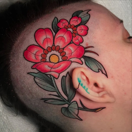 Medium American Traditional Red Flowers and Leaves Tattoo on Women Head by @inkbybrina