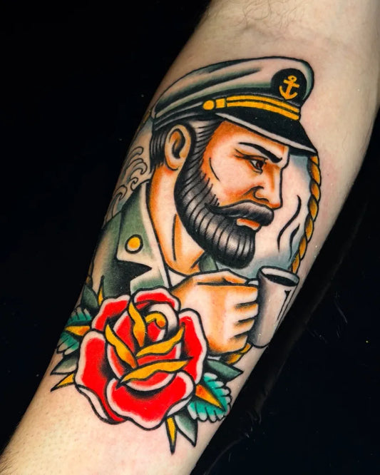 Medium American Traditional Sailor with Rose and Coffee Nautical Tattoo on Men Arm by @renot_aragontattoo