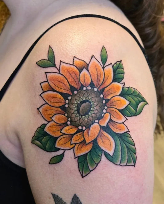Medium American Traditional Sunflower Leaves on Women Shoulder Tattoo by @jessicachanner