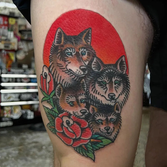 Medium American Traditional Wolf Family Tattoo on Men Thigh by @tatzapper