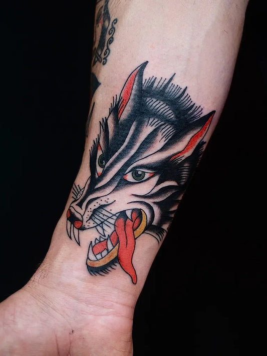 Medium American Traditional Wolf Head on Men Forearm Tattoo by @jake_axl
