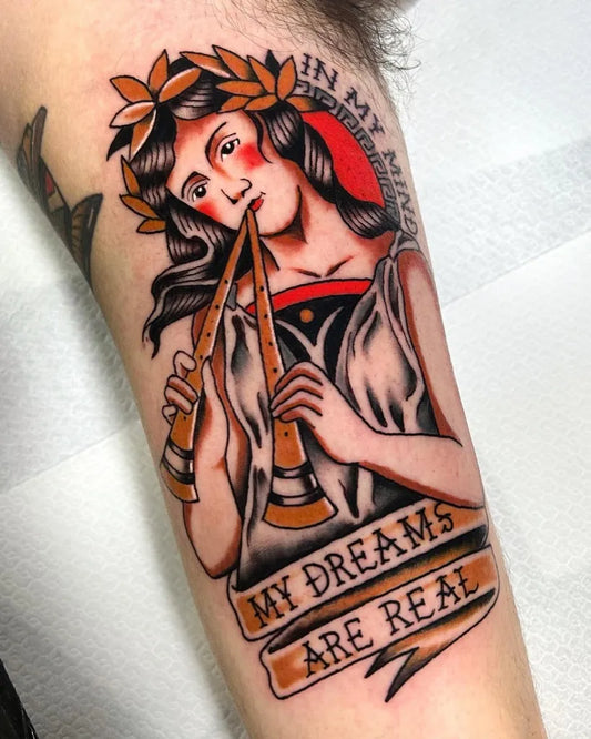 Medium American Traditional Woman Playing Flutes Music Tattoo on Men Arm by @isasantanatattoo