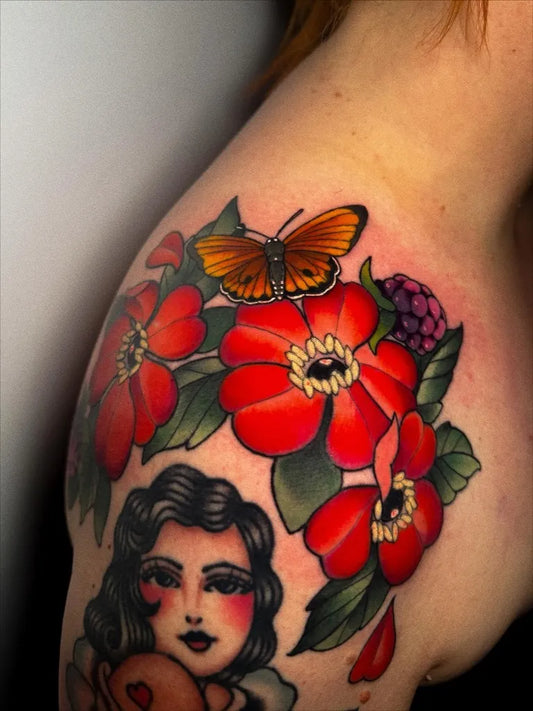 Medium American Traditional Woman with Butterfly and Flowers Tattoo on Women Shoulder by @sarahameliatattoos