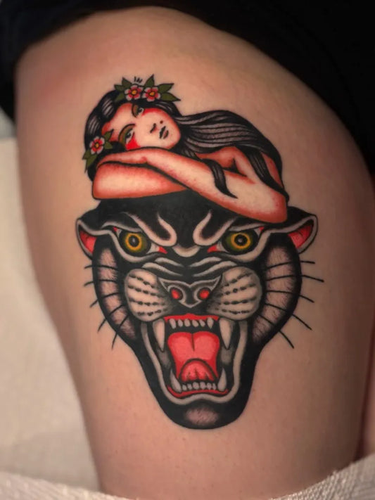 Medium American Traditional Woman with Flowers and Panther Tattoo on Women Thigh by @j.r.smith____