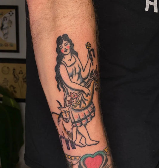 Medium American Traditional Woman with Goat and Flowers Spiritual Tattoo on Women Arm by @casanu