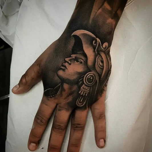Medium Aztec Aztec Warrior Helmet Tattoo on Men Hand by @mexicanstyle_tattoos