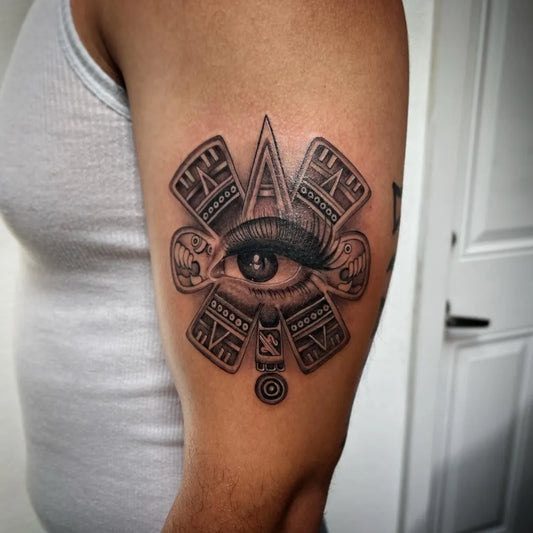 Medium Aztec Eye Tattoo on Men Arm by @javitsunamitattoos