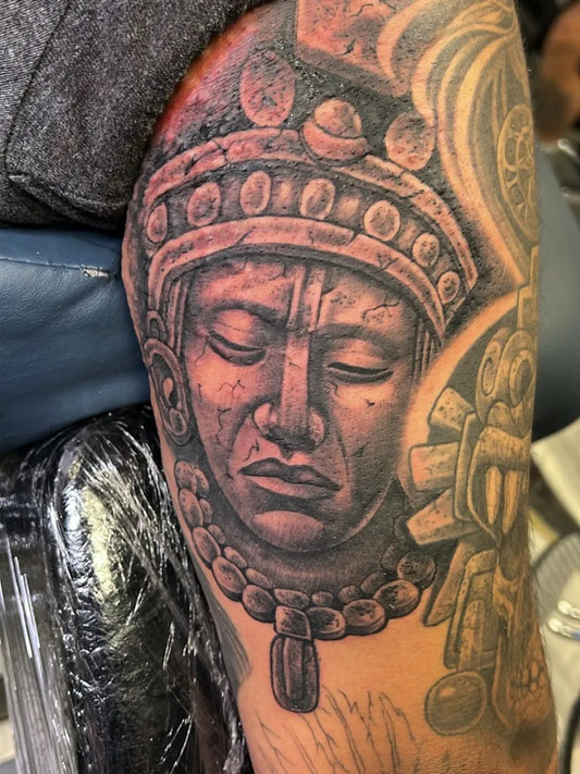 Medium Aztec Mayan Warrior Face Tattoo on Men Arm by @edgar_bigserio_tattoo