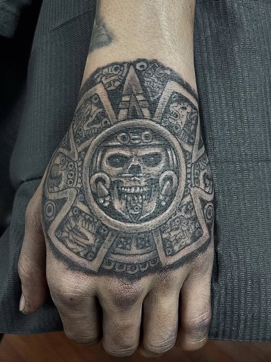 Medium Aztec Sun Calendar Tattoo on Men Hand by @inkbyj818