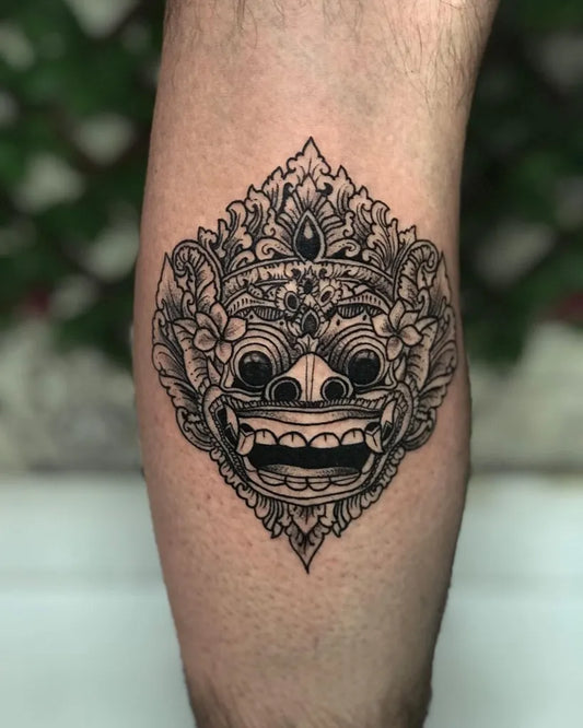 Medium Balinese Style Barong Mask on Men Leg Tattoo by @boncu_lumina_tattoo