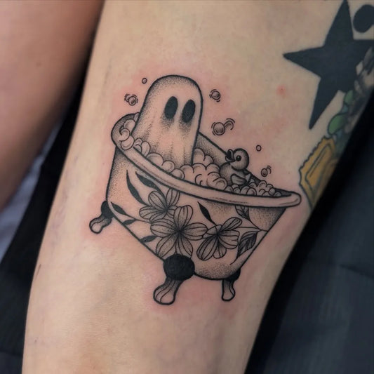 Medium Batching Ghost Tattoo on Women Arm by @tats_by_smeh