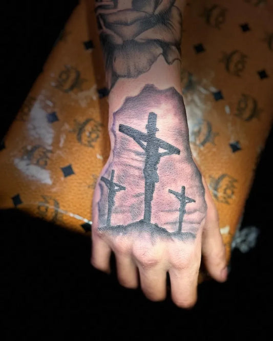 Medium Black and Grey 3 Crosses Tattoo on Men Hand by @staytruetattoo806