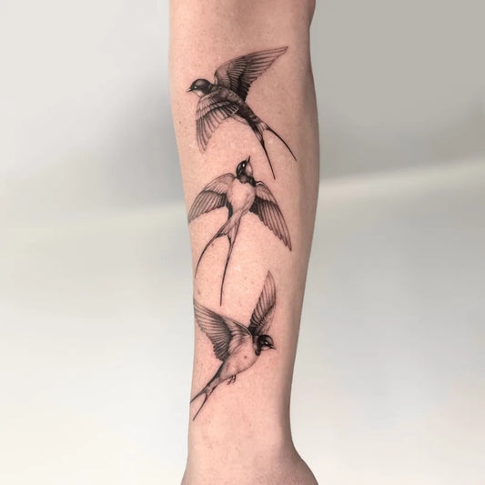 Medium Black and Grey 3 Swallow Tattoo on Women Arm by @anisa.ink