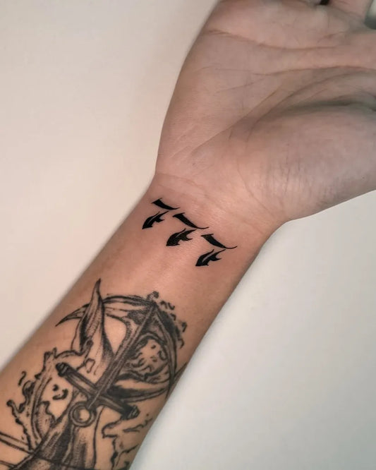 Medium Black and Grey 777 Tattoo on Men Wrist by @inkbysheng