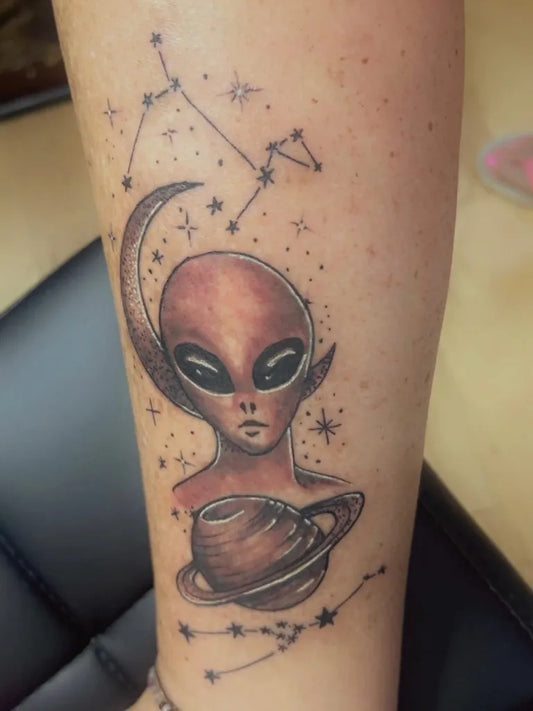 Medium Black and Grey Alien with Moon and Saturn Tattoo on Women Leg by @eciartistpage