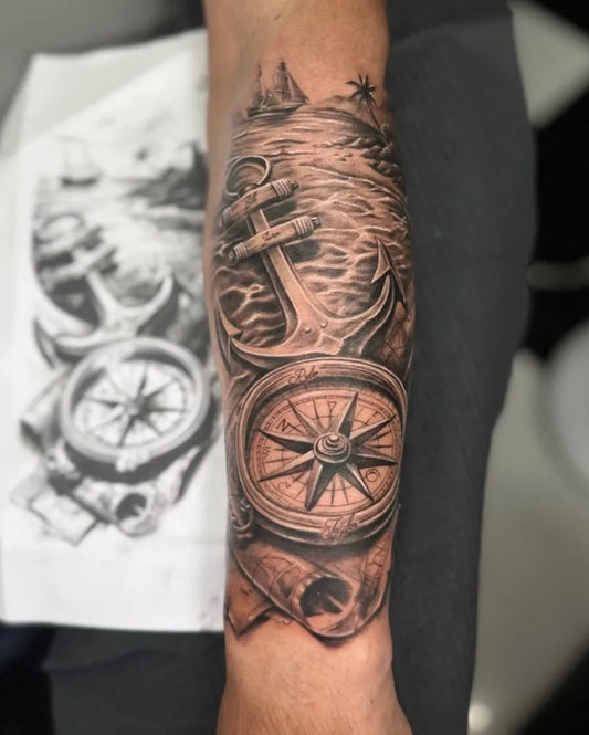 Medium Black and Grey Anchor Compass and Scroll Tattoo on Men Arm by @fametattoophuket