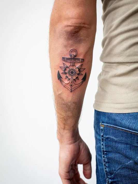 Medium Black and Grey Anchor Tattoo on Men Arm by @annedekkertattoo