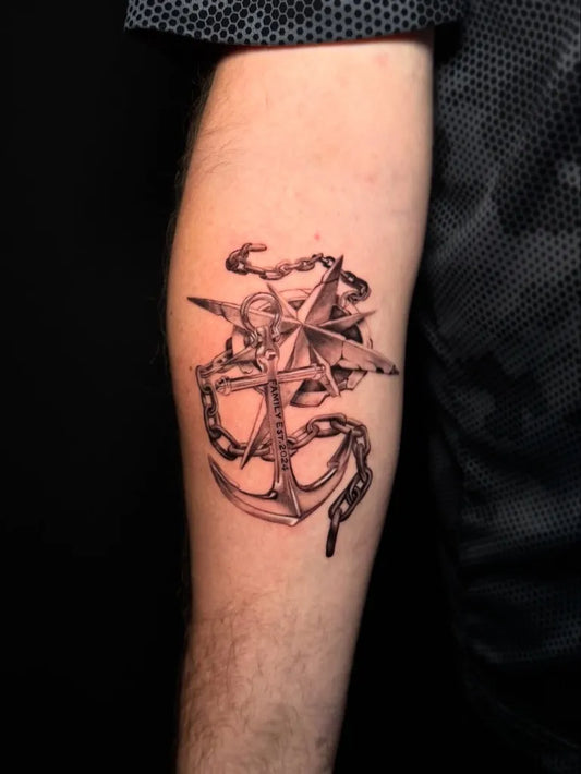 Medium Black and Grey Anchor and Compass Tattoo on Men Arm by @prettyboyvoid