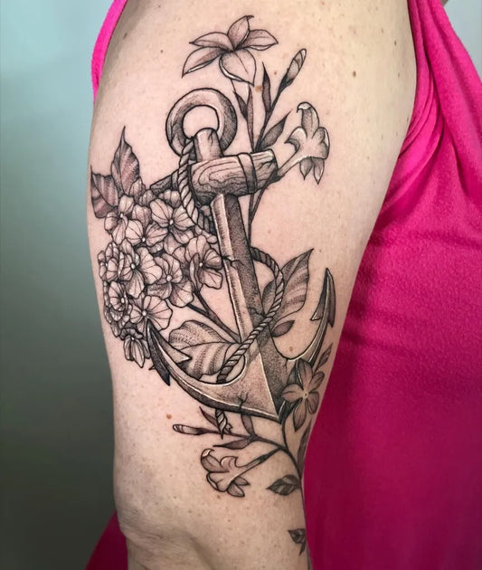 Medium Black and Grey Anchor and Flowers Tattoo on Women Arm by @nixoleta_urielatattoo
