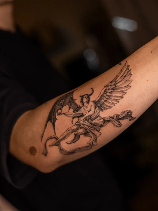 Medium Black and Grey Angel Demon on Men Arm Tattoo by @the.o.tattoo