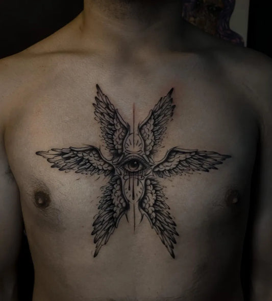 Medium Black and Grey Angel Wings Eye Tattoo on Men Chest by @chico.choo