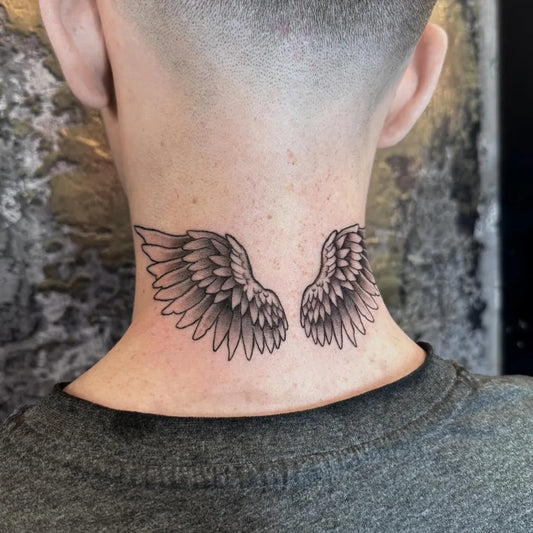 Medium Black and Grey Angel Wings Tattoo on Men Neck by @btn_tattoos