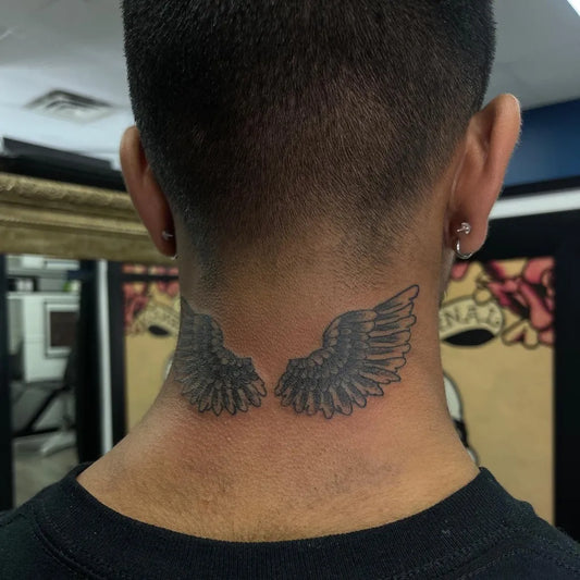 Medium Black and Grey Angel Wings Tattoo on Men Neck by @re.inkarnacion
