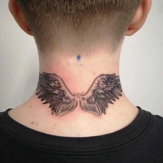 Medium Black and Grey Angel Wings Tattoo on Men Neck by @southeastink