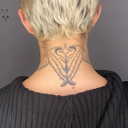 Medium Black and Grey Angel Wings Tattoo on Women Neck by @blueteeth.ttt