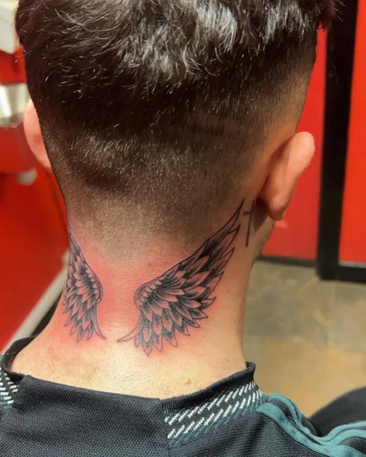 Medium Black and Grey Angel Wings and Cross Tattoo on Men Neck by @gfrasertattoos