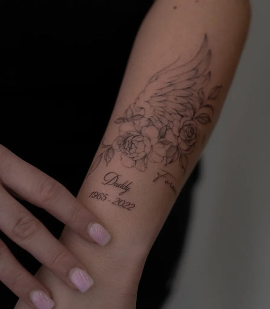 Medium Black and Grey Angel Wings and Roses Tattoo on Women Arm by @monxro