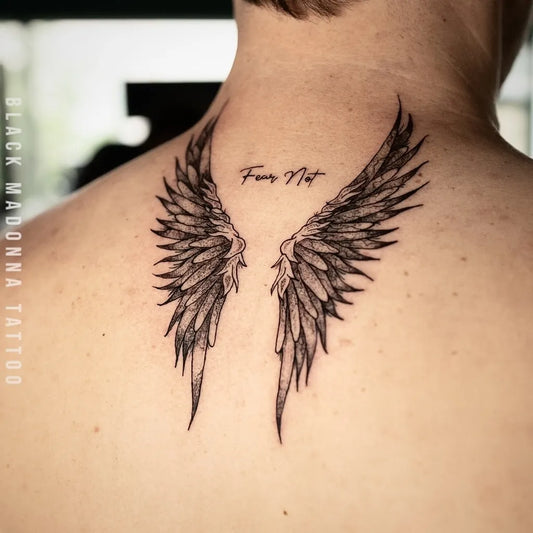 Medium Black and Grey Angel Wings with Text Tattoo on Men Back by @dafishdesign
