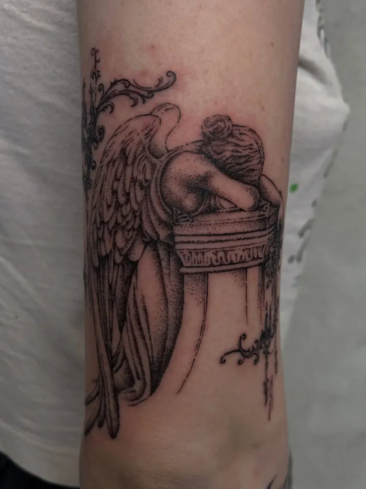 Medium Black and Grey Angel on Tombstone on Women Arm Tattoo by @pixi.tt