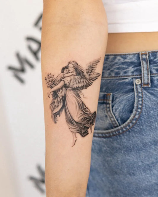 Medium Black and Grey Angel with Flowers on Women Arm Tattoo by @jodiehedley.tattoos