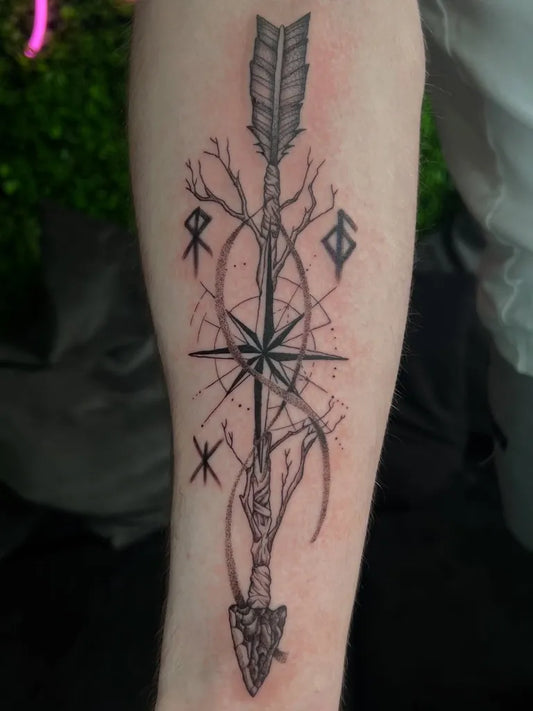 Medium Black and Grey Arrow Rune Compass Tattoo on Men Arm by @emiliariosart