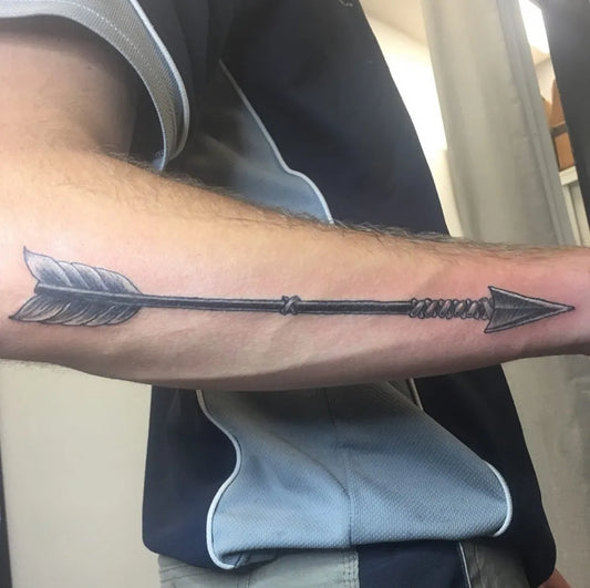 Medium Black and Grey Arrow Tattoo on Men Arm by @heisenberg_ink