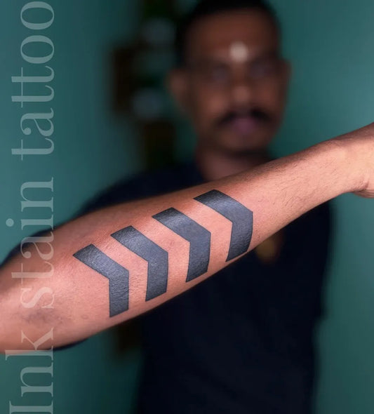 Medium Black and Grey Arrow Tattoo on Men Arm by @ink_stain__tattoostudio