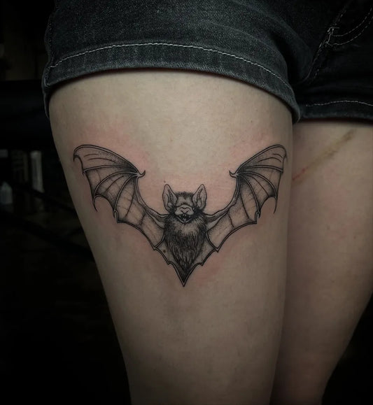Medium Black and Grey Bat Tattoo on Women Thigh by @porcelainink
